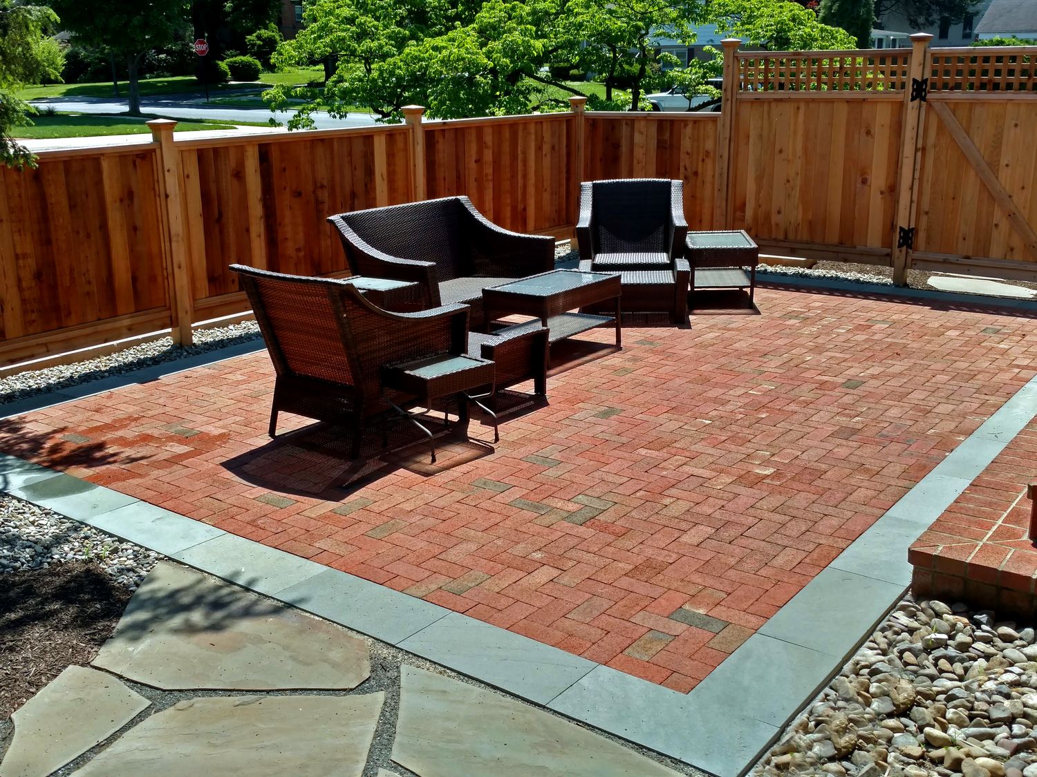 Red brick paver patio with bluestone border and cedar privacy fence, West End Allentown PA